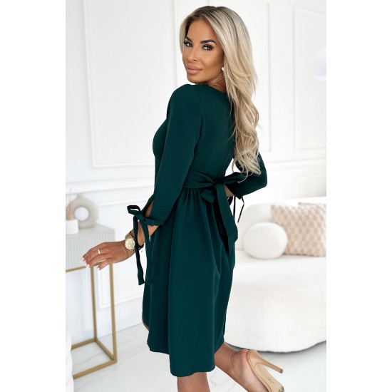 Елегантна рокля с връзки в зелен цвят 195-11 Елегантна рокля с връзки в зелен цвят 195-11